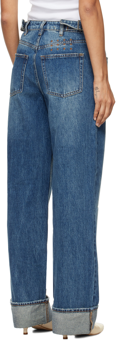 KSUBI BLUE LOW RIDER CUFFED AGED JEANS 