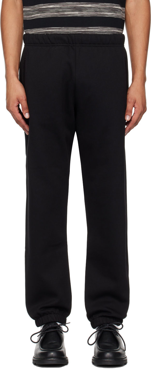 Shop Carhartt Black Chase Sweatpants In 00fxx Black / Gold