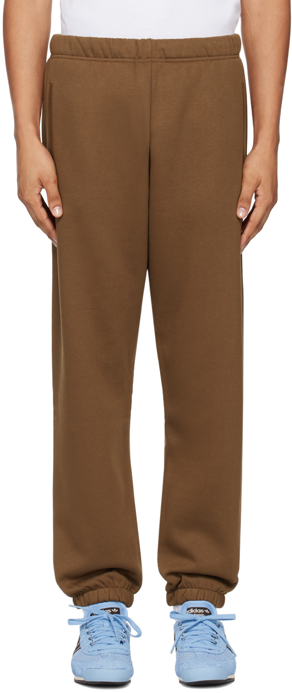 Shop Carhartt Brown Chase Sweatpants In 218xx Chocolate / Go