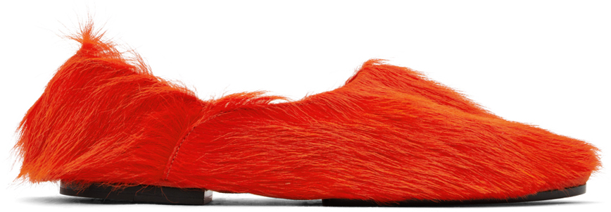 Shop Jil Sander Orange Long Hair Pony Loafers In 626 Poppy