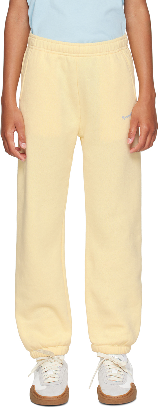 Kids Yellow Printed Serif Logo Sweatpants by Sporty Rich on Sale