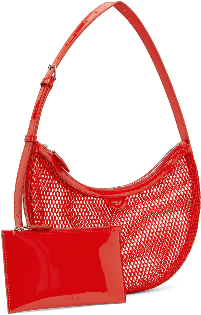 Alaïa Small Half-moon Fishing Net Underarm Bag In 319 - Orange Sanguin