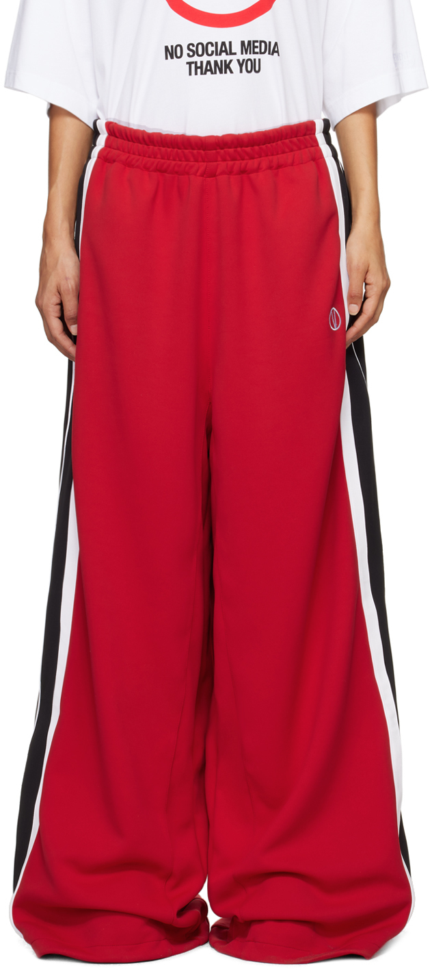 VETEMENTS RED GYM TRACK PANTS 