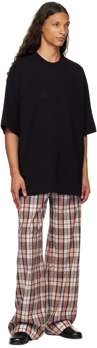 Vetements Logo-embossed T-shirt In Black