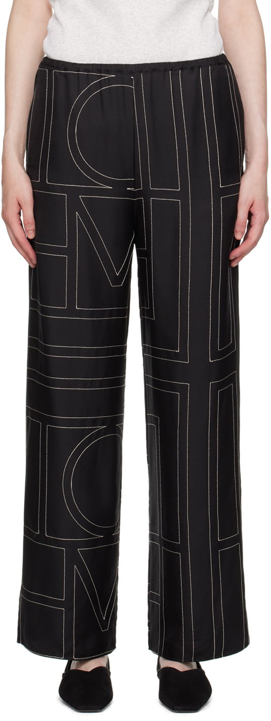 Shop Totême Black Monogram Lounge Pants In 925 Black Monogram