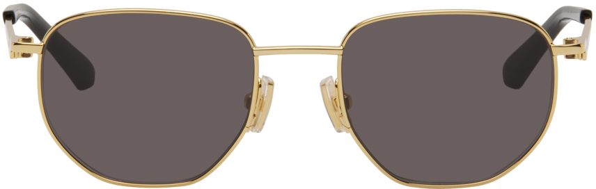Shop Bottega Veneta Gold Round Sunglasses In Gold-gold-grey