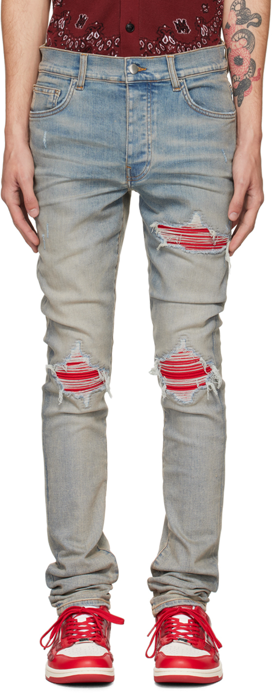 Amiri Mx1 Skinny-fit Panelled Distressed Jeans In Antique Indigo