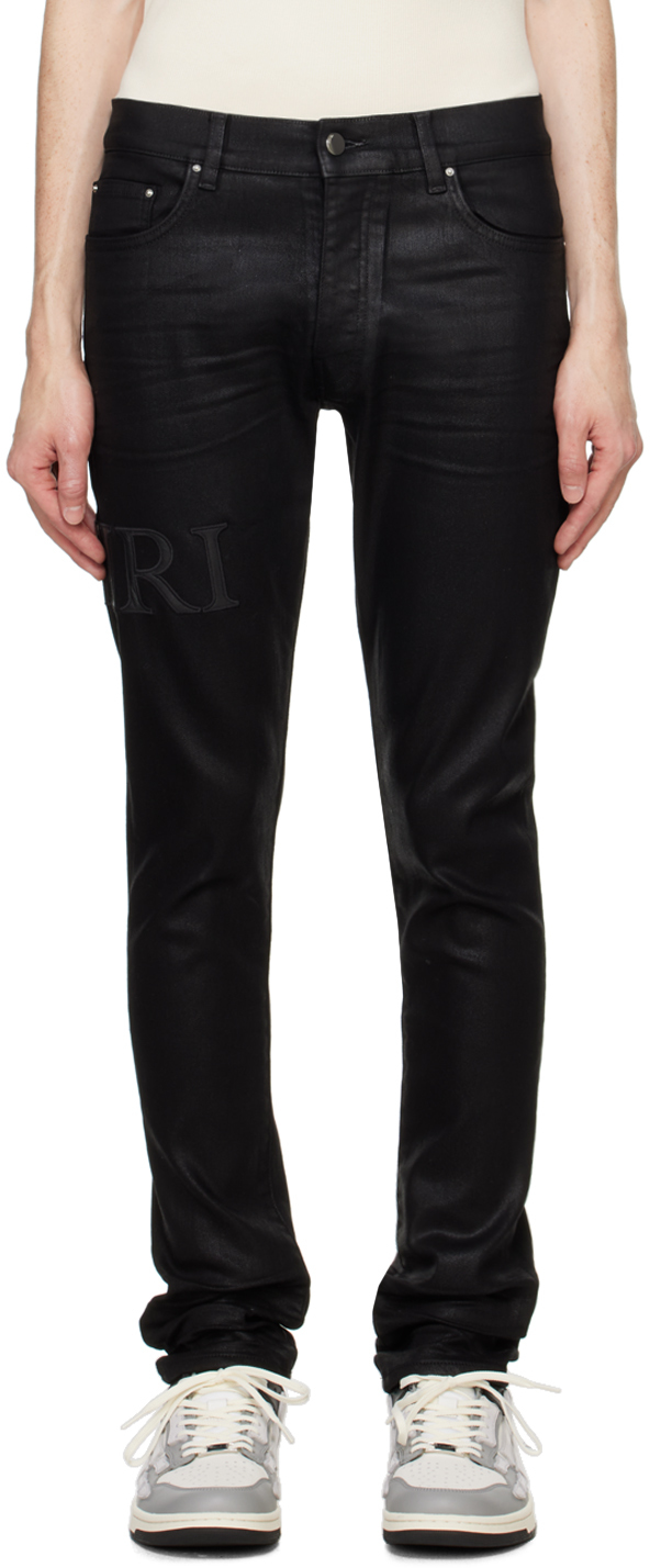 Shop Amiri Black Serif Logo Wax Skinny Jeans