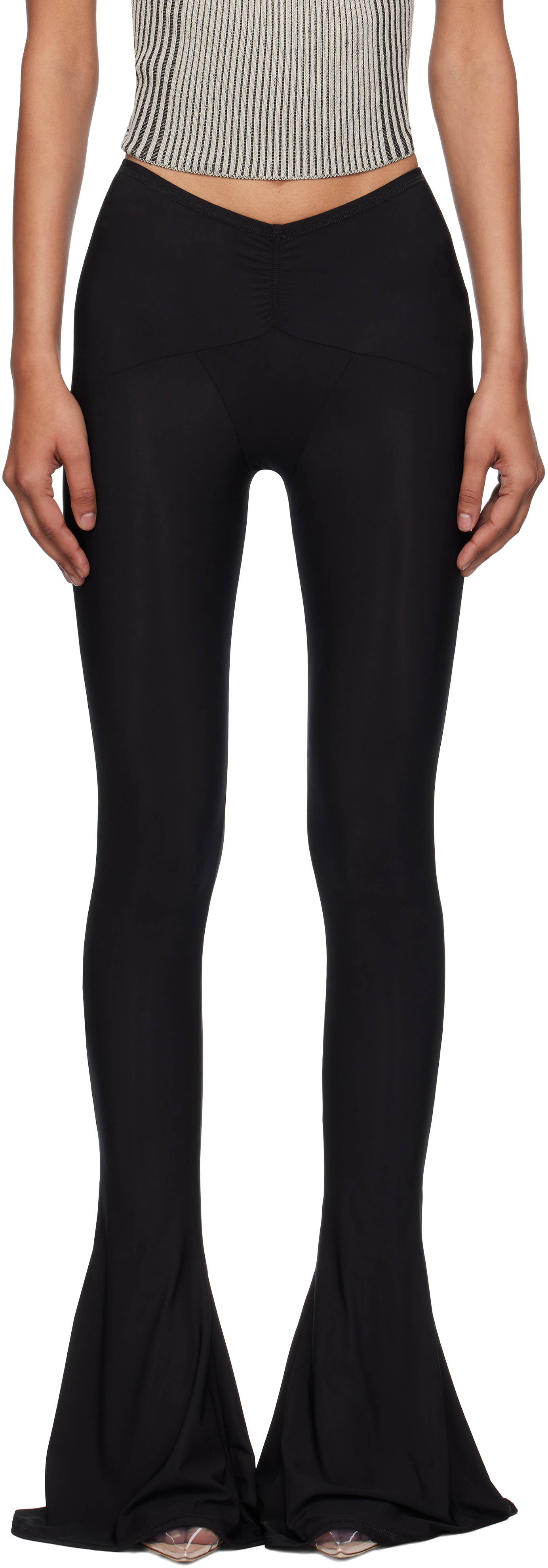 Black Ghost Trousers by KNWLS on Sale