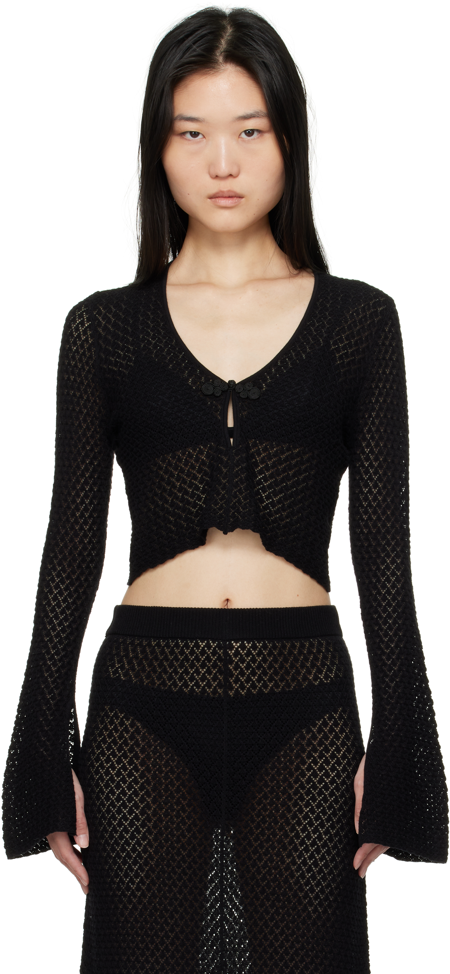 Black Tanzania Short Blouse by The Garment on Sale