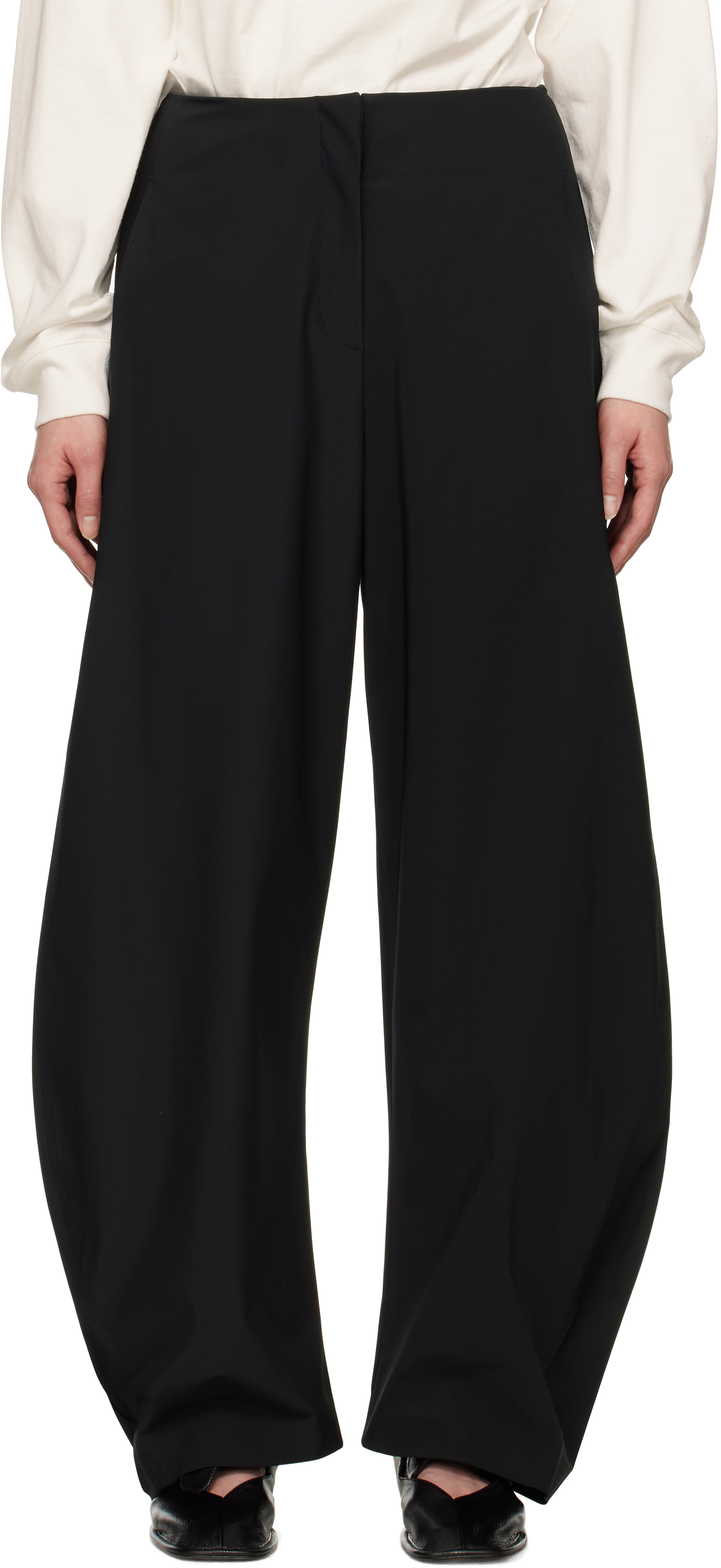 Black Curved Silhouette Trousers by AMOMENTO on Sale