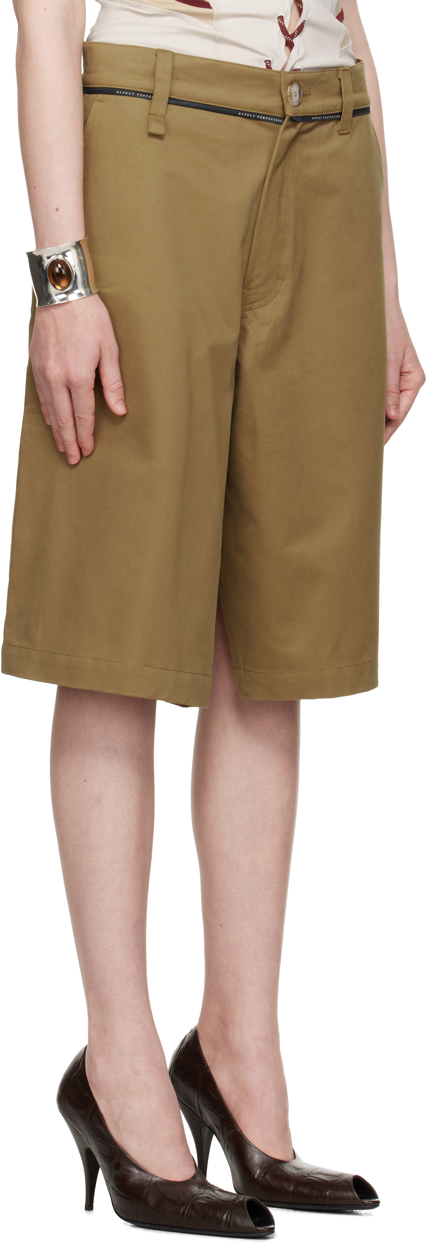 MARTINE ROSE KHAKI TWISTED SKATE SHORTS