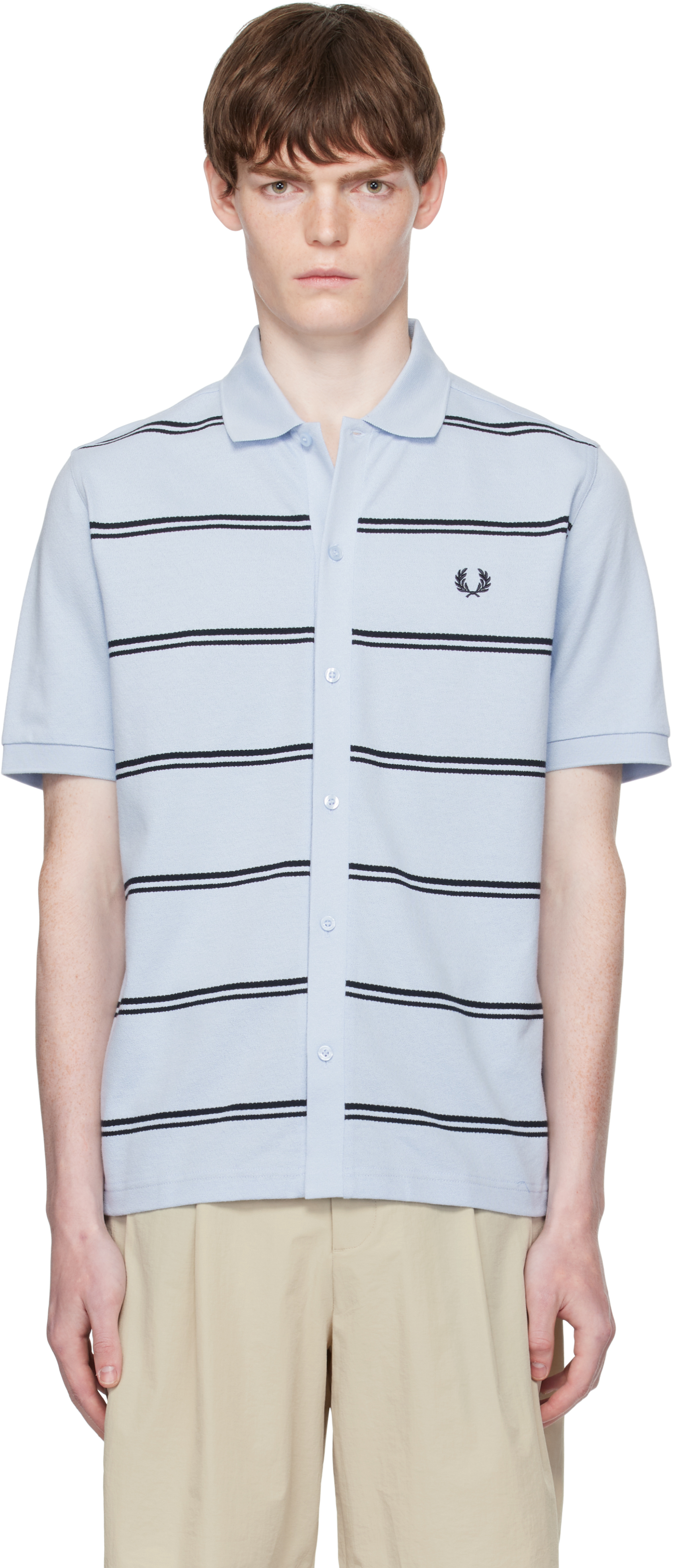 perry ページです。 Fred Perry: Blue Striped Button Through Polo Shirt | SSENSE