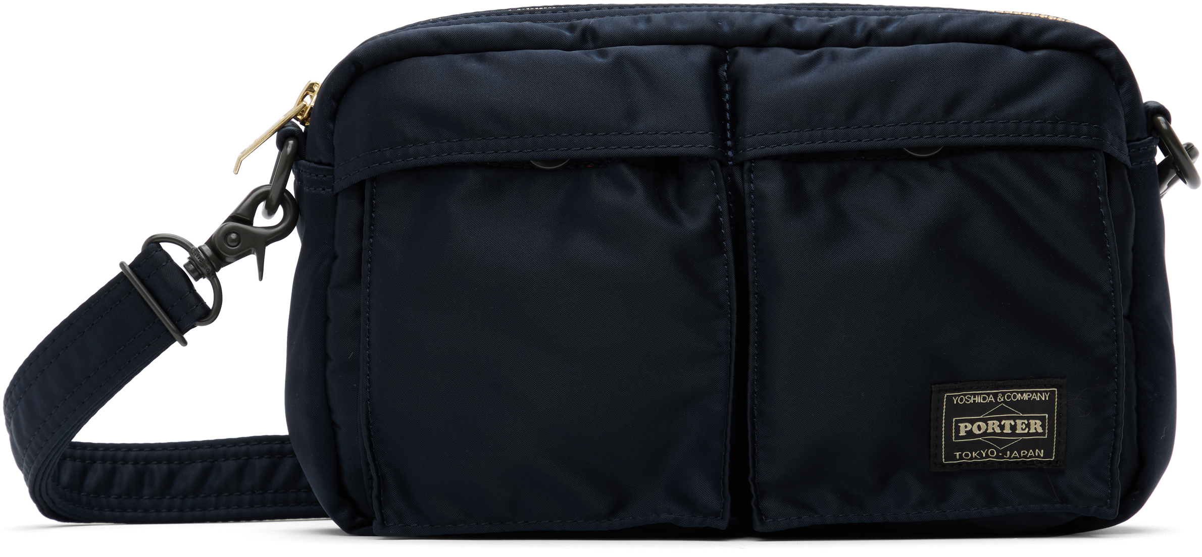 PORTER - Yoshida & Co: Navy Tanker Sling Bag | SSENSE Canada PORTER - Yoshida & Co: Navy Tanker Sling Bag | SSENSE Canada