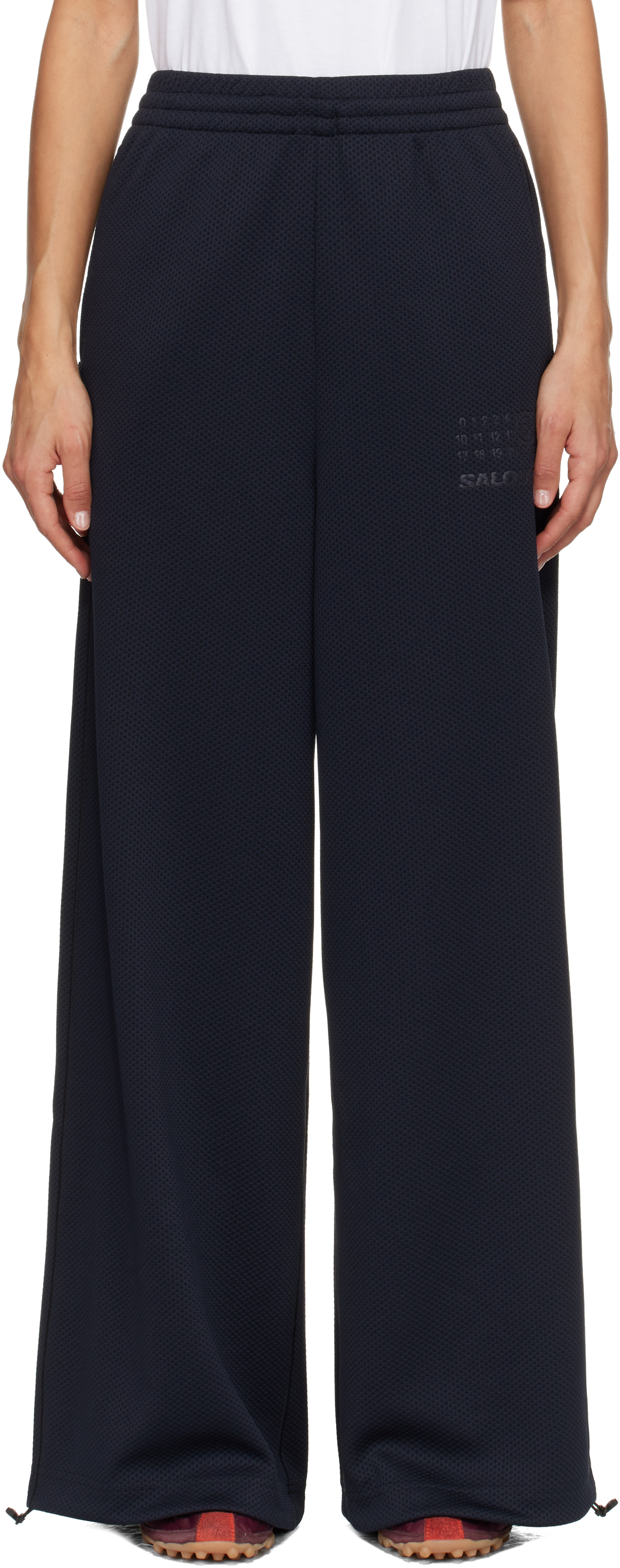 Mm6 Maison Margiela Black Salomon Edition Mesh Sweatpants In Black