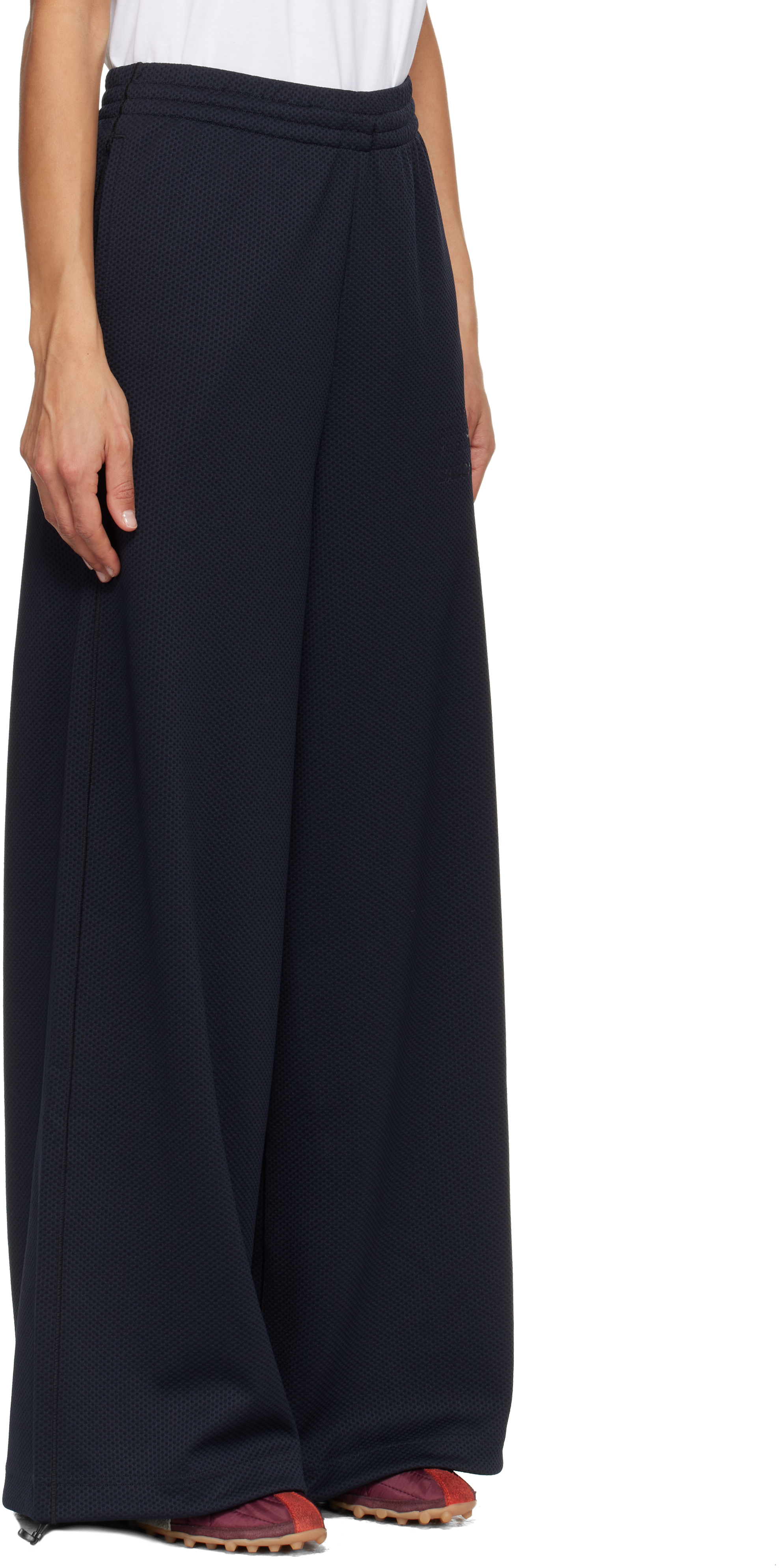 Mm6 Maison Margiela Black Salomon Edition Mesh Sweatpants In Black