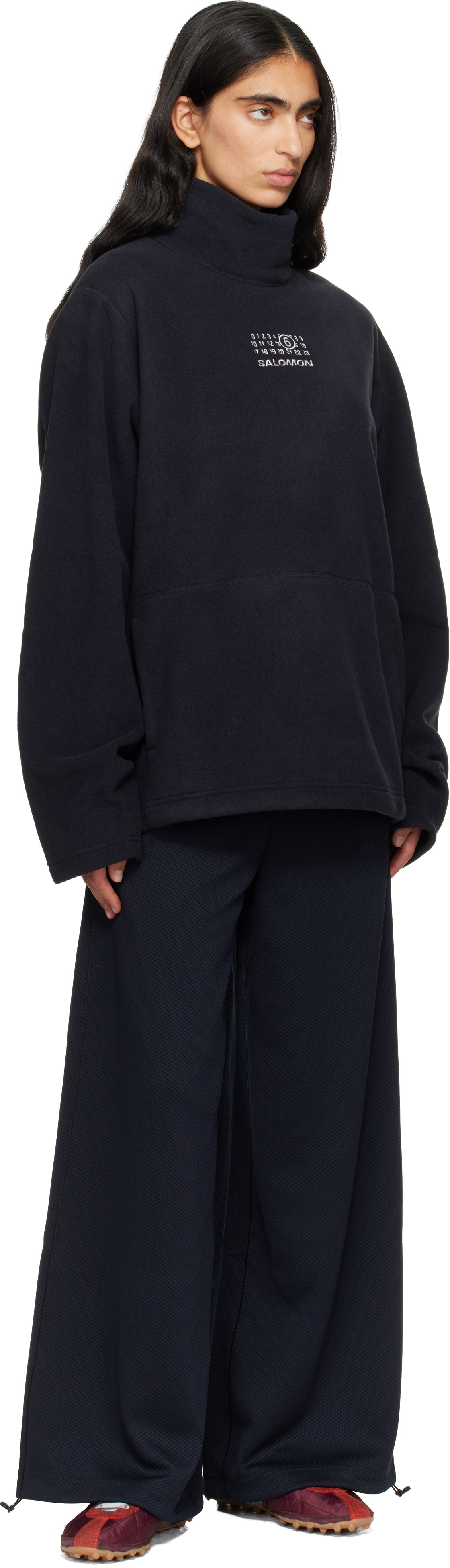 Mm6 Maison Margiela Black Salomon Edition Mesh Sweatpants In Black