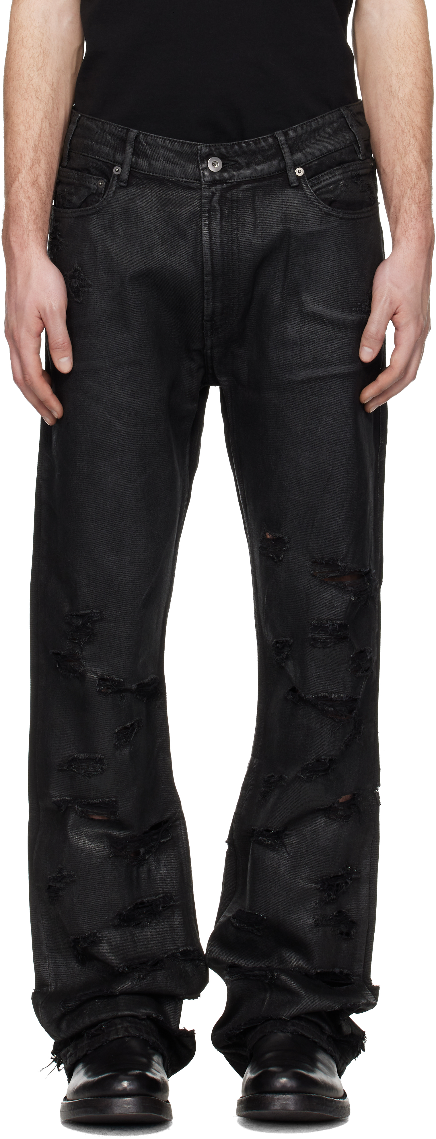 DET BLEV SENT: Black Waxed Belvidere Jeans | SSENSE