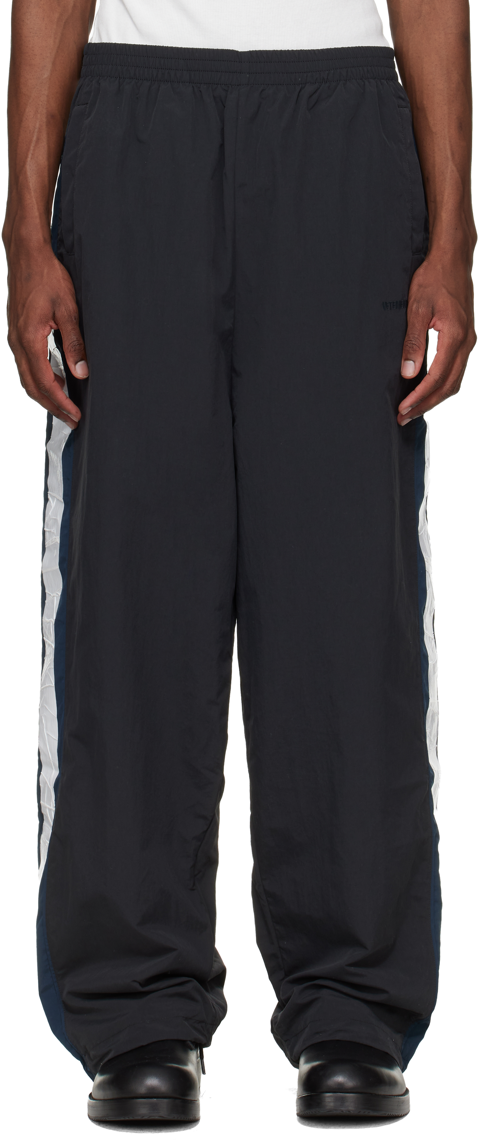 VETEMENTS: Black Gym Track Pants | SSENSE