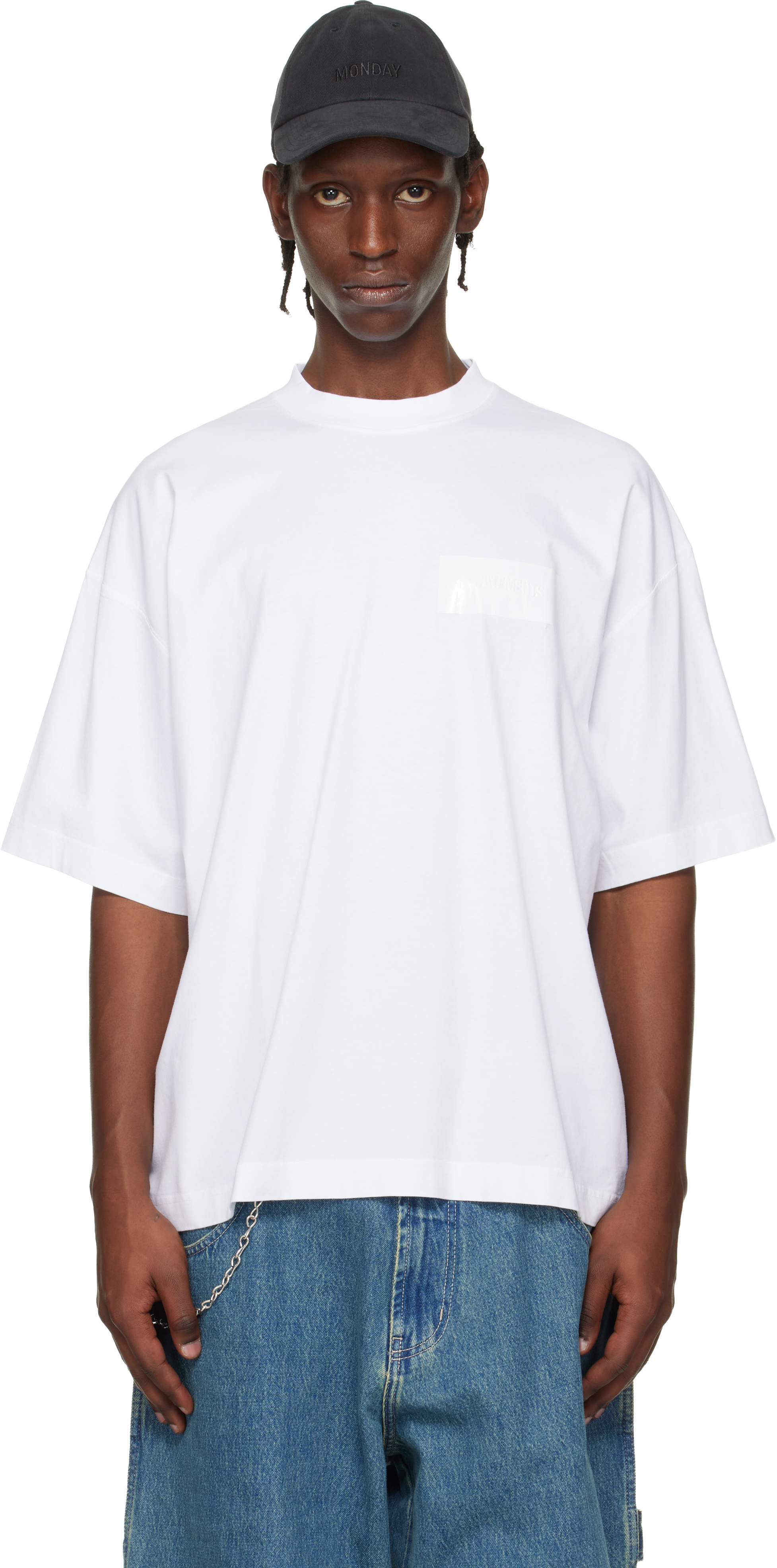 VETEMENTS: White Taped Logo T-shirt | SSENSE