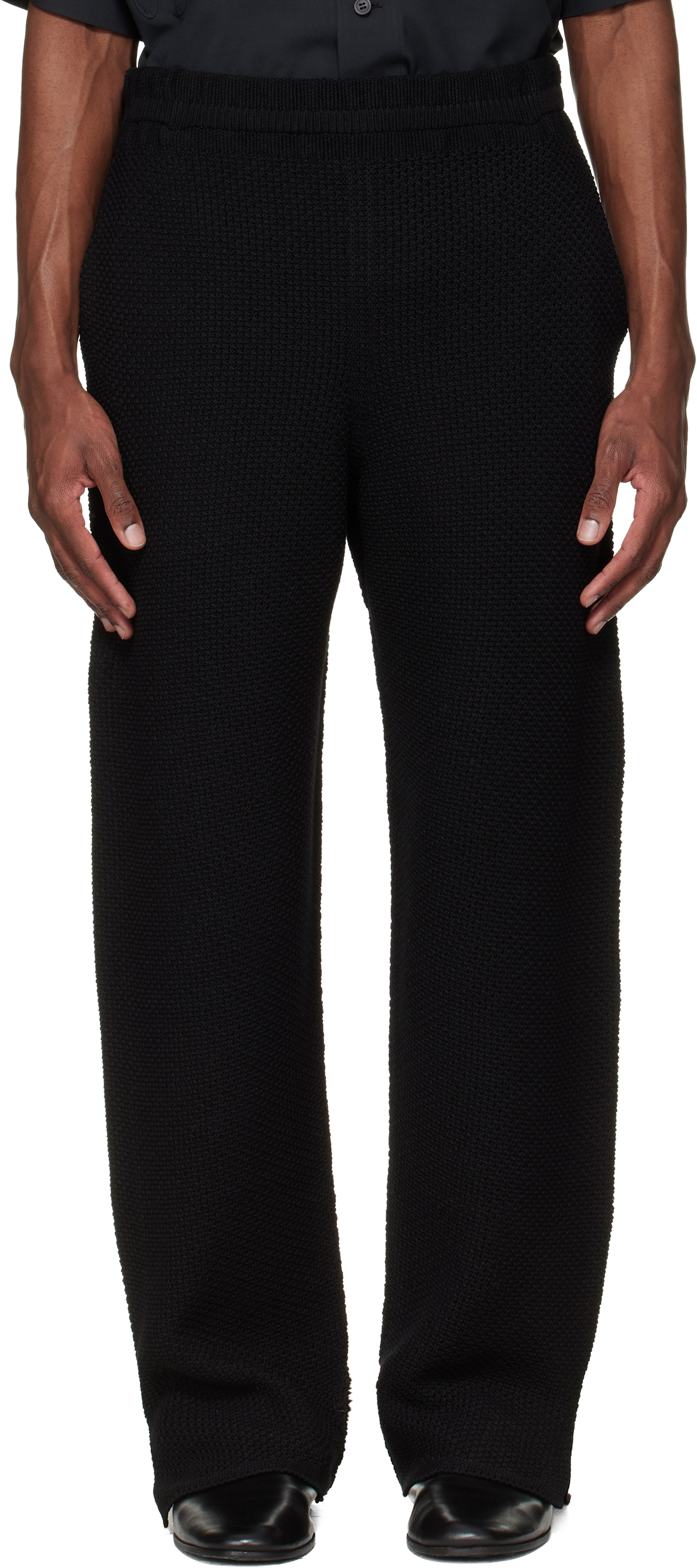 HOMME PLISSÉ ISSEY MIYAKE: Black Rustic Knit Trousers | SSENSE
