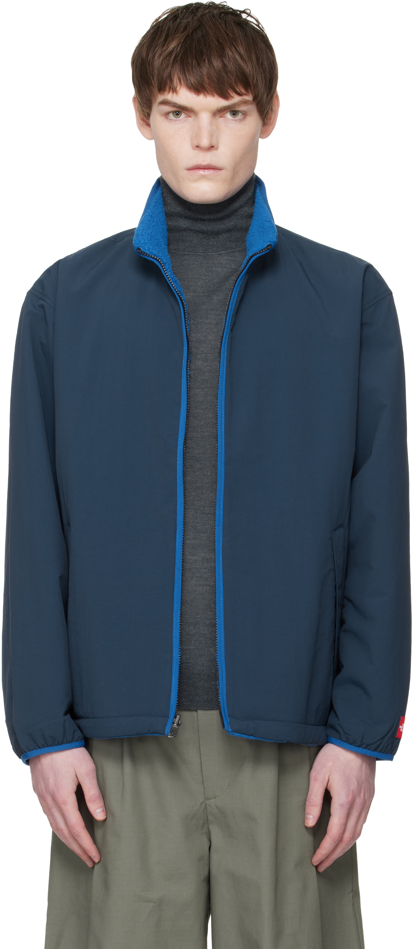 The North Faceのネイビー TNF Red Box リバーシブル フリース