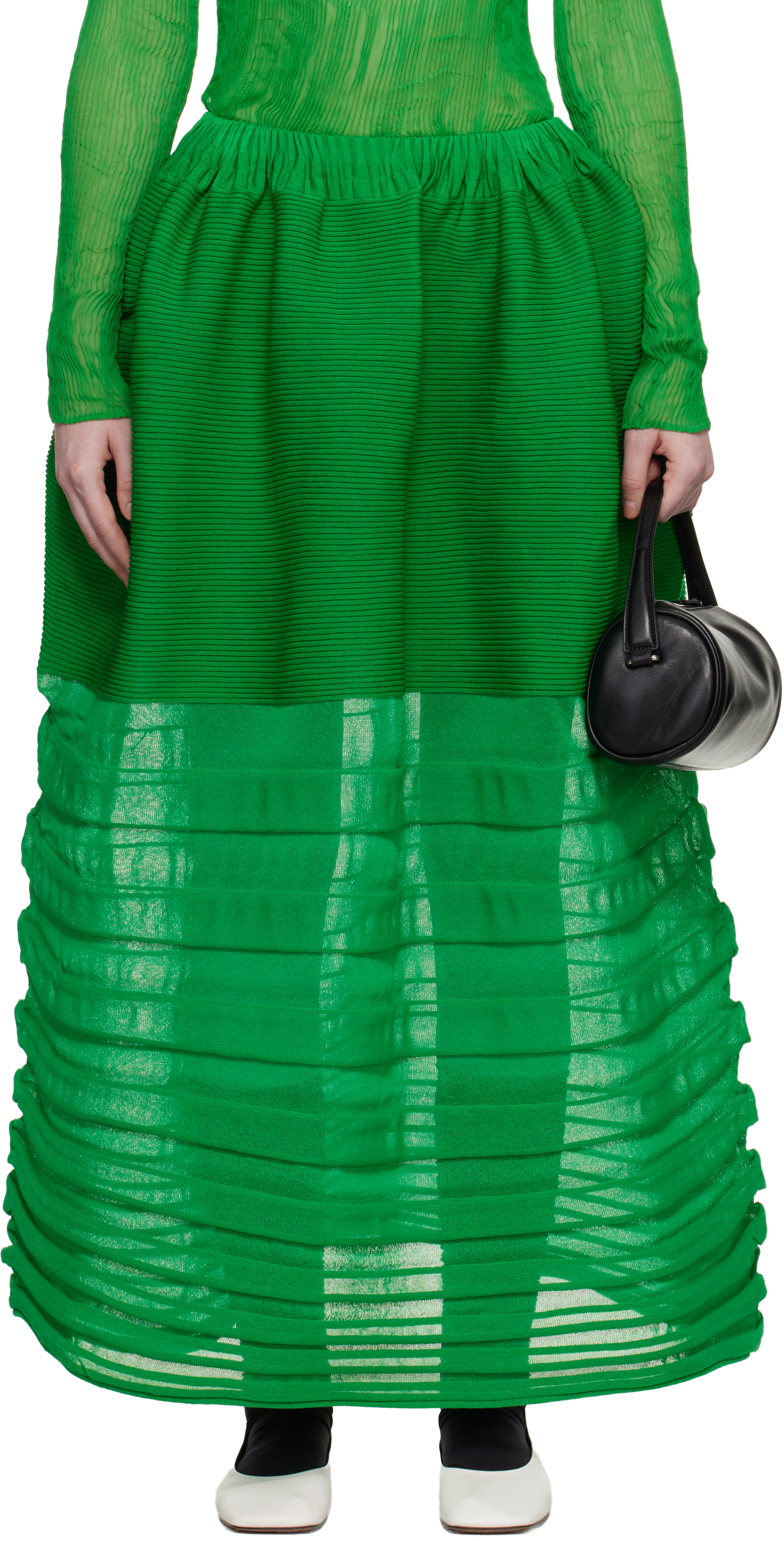 Green December Moving Knit Midi Skirt by ISSEY MIYAKE on Sale