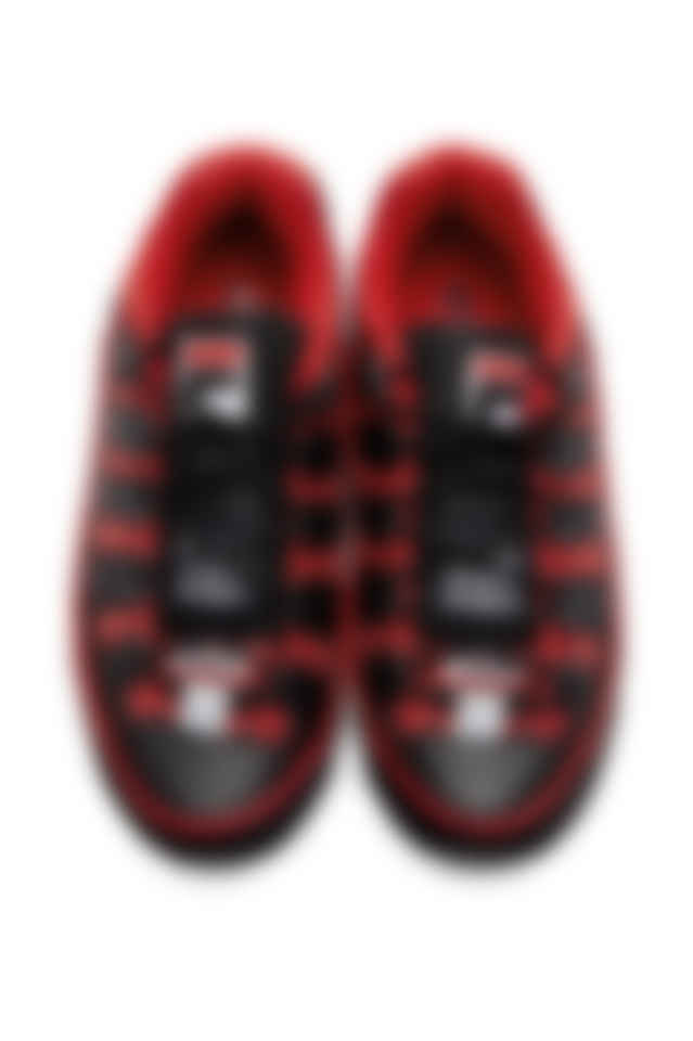 black and red fila trainers