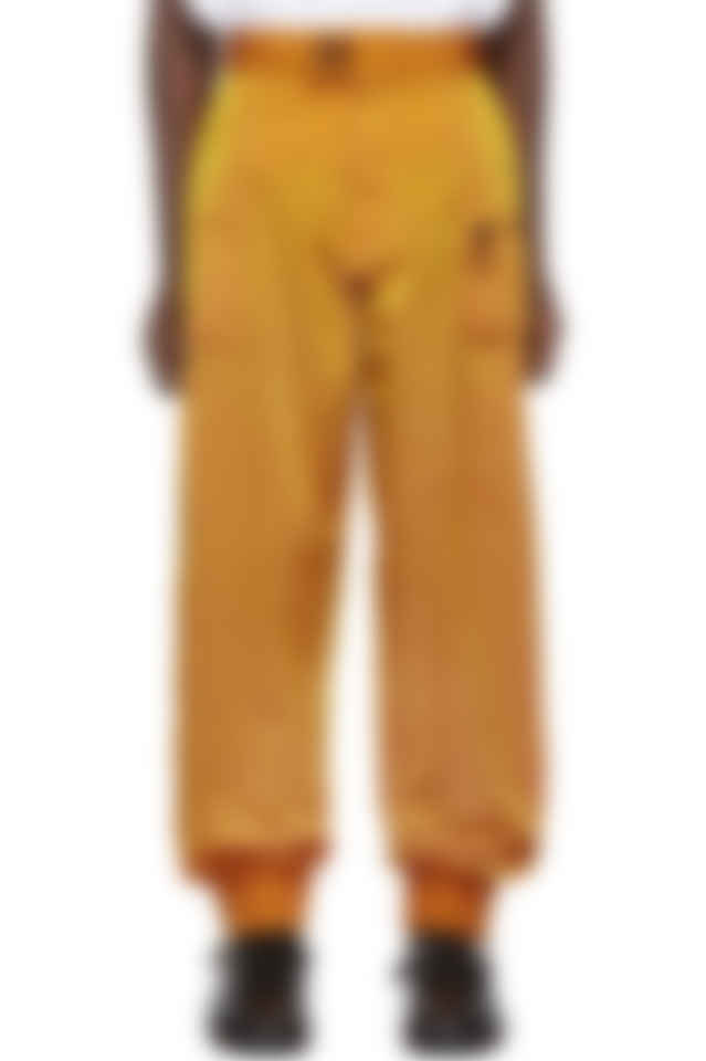 orange and white track pants