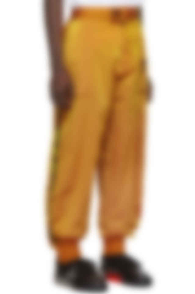 orange and white track pants