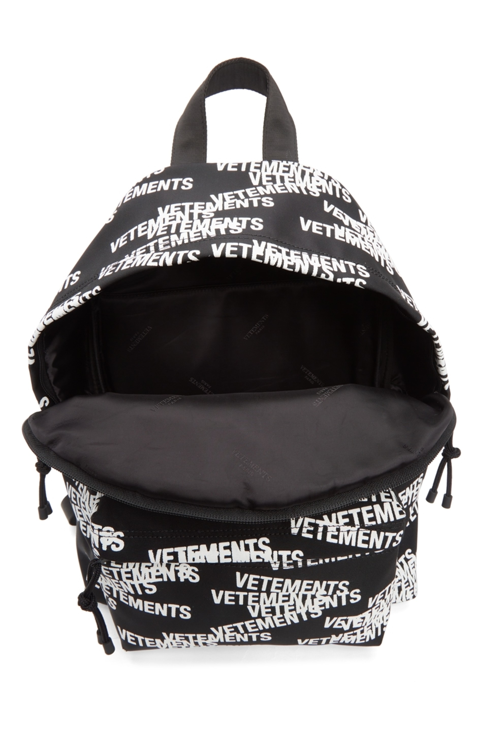 vetements-black-and-white-logo-stamp-backpack.jpg