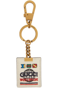 Gucci - Porte-clés blanc cassé et doré 'Gucci Worldwide'