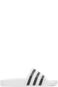 adidas Originals - Sandales à enfiler blanches et noires Adilette