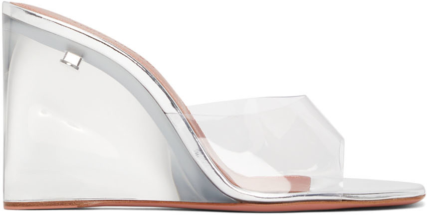 https://img.ssensemedia.com/images/b_white,g_center,f_auto,q_auto:best/211415F125062_1/amina-muaddi-silver-glass-lupita-wedge-heeled-sandals.jpg