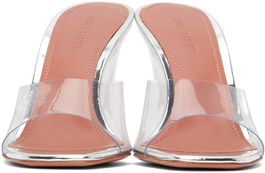 https://img.ssensemedia.com/images/b_white,g_center,f_auto,q_auto:best/211415F125062_2/amina-muaddi-silver-glass-lupita-wedge-heeled-sandals.jpg