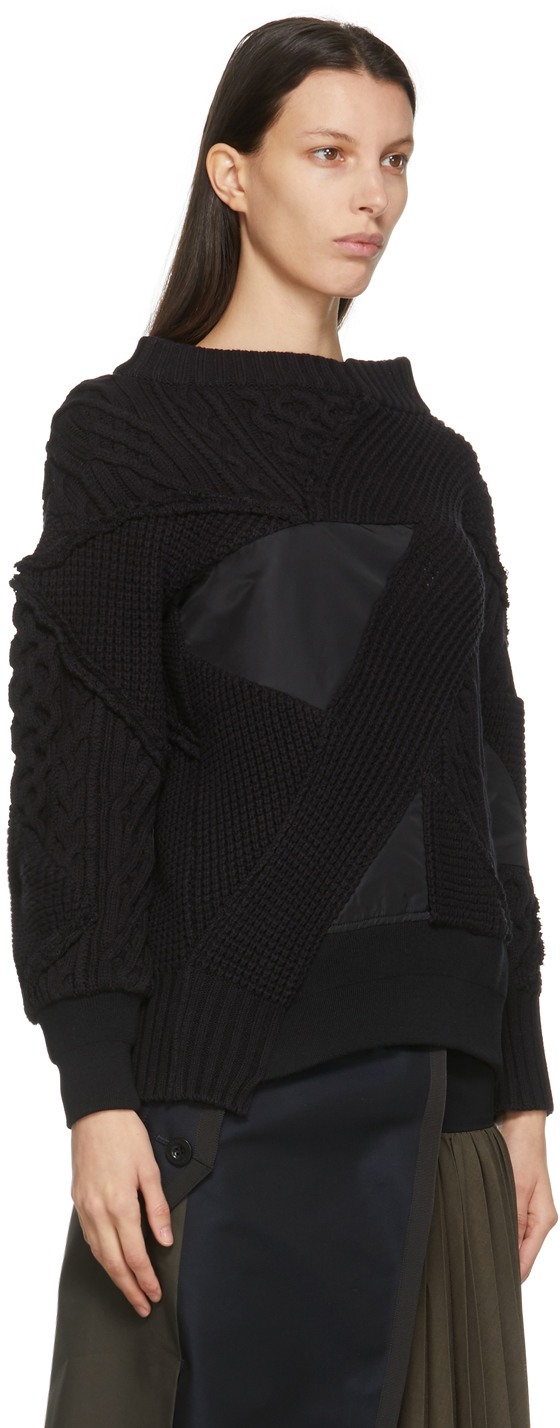 https://img.ssensemedia.com/images/b_white,g_center,f_auto,q_auto:best/211445F096000_2/sacai-black-hank-willis-thomas-edition-mix-knit-pullover-sweater.jpg