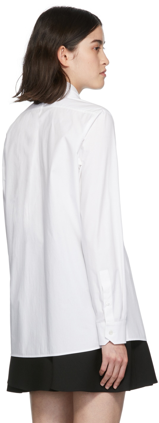 https://img.ssensemedia.com/images/b_white,g_center,f_auto,q_auto:best/212476F109013_3/valentino-white-detachable-collar-poplin-shirt.jpg
