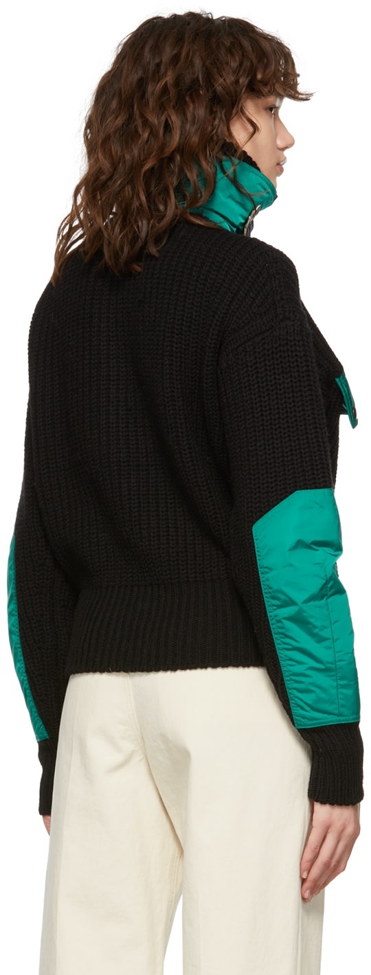 https://img.ssensemedia.com/images/b_white,g_center,f_auto,q_auto:best/212600F097020_3/isabel-marant-black-wool-dempster-sweater.jpg