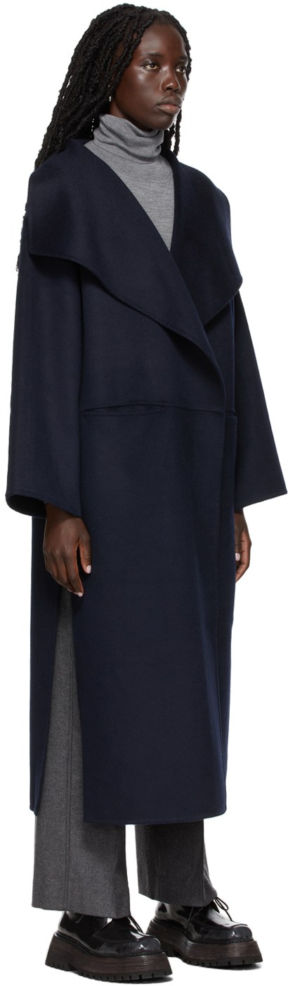 https://img.ssensemedia.com/images/b_white,g_center,f_auto,q_auto:best/212771F059021_2/toteme-signature-wool-cashmere-coat.jpg