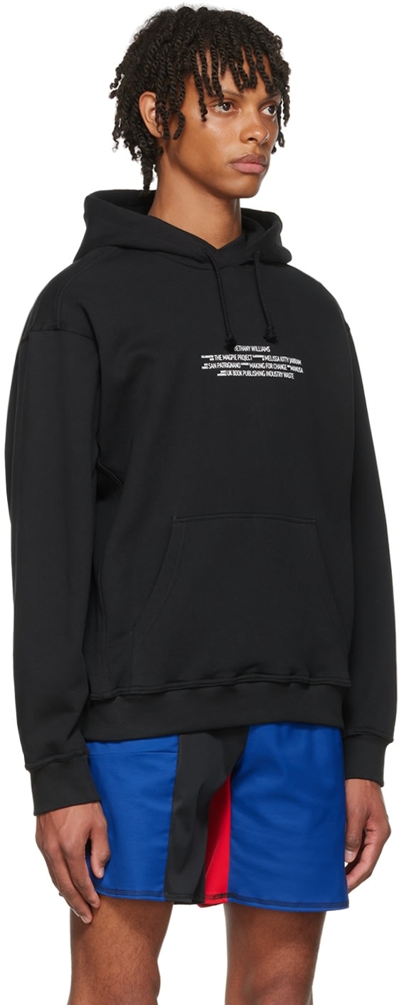 https://img.ssensemedia.com/images/b_white,g_center,f_auto,q_auto:best/221562M202031_2/bethany-williams-black-the-magpie-project-and-making-for-change-edition-hoodie.jpg