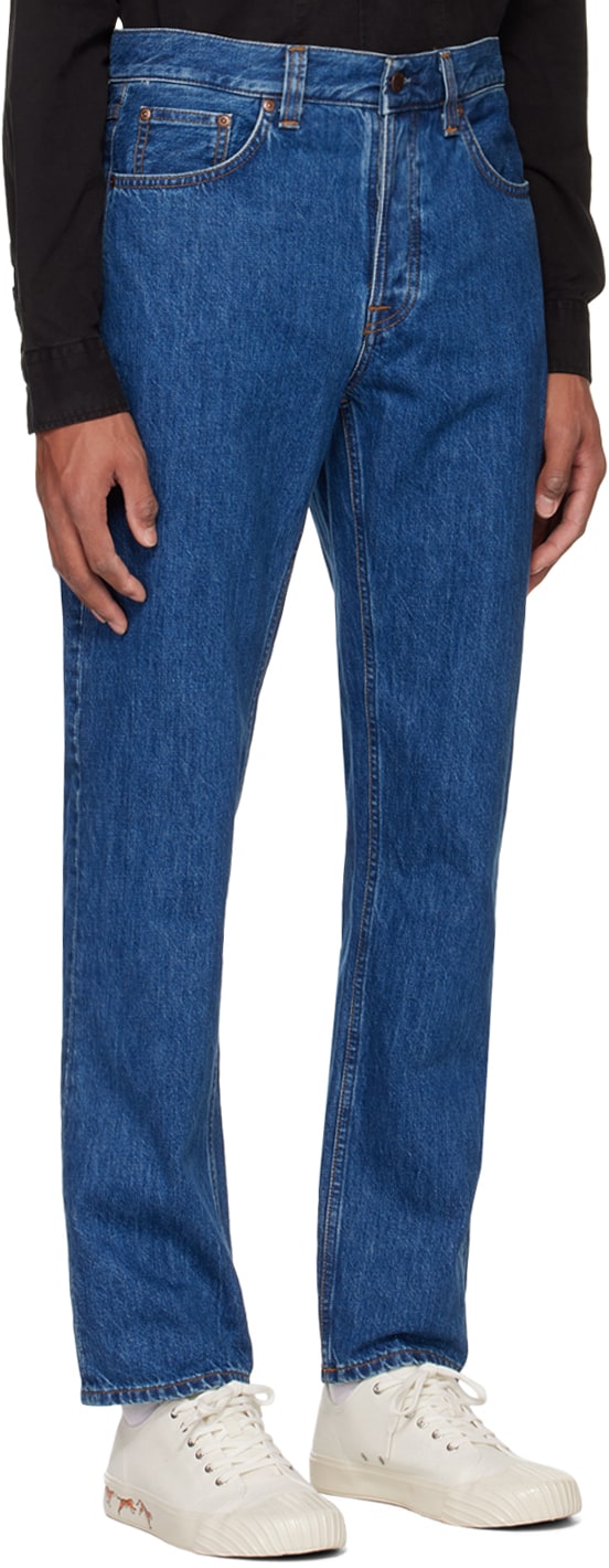 https://img.ssensemedia.com/images/b_white,g_center,f_auto,q_auto:best/222078M186081_2/nudie-jeans-blue-rad-rufus-jeans.jpg