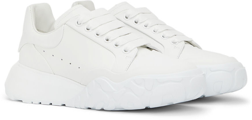 https://img.ssensemedia.com/images/b_white,g_center,f_auto,q_auto:best/222259M237021_4/alexander-mcqueen-white-court-trainer-sneakers.jpg
