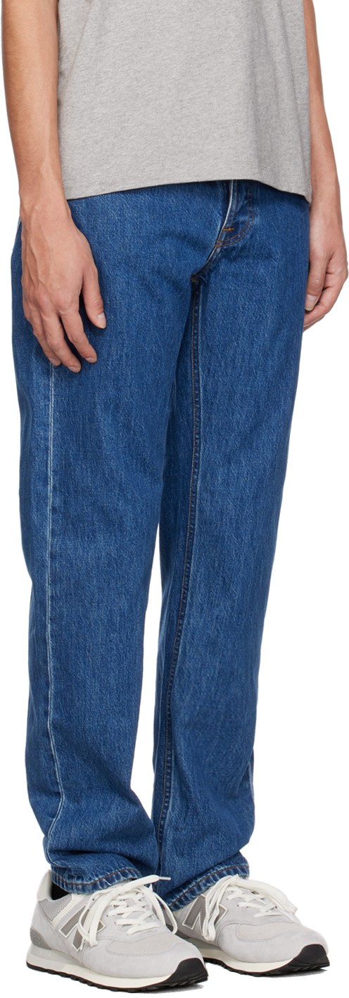 https://img.ssensemedia.com/images/b_white,g_center,f_auto,q_auto:best/231078M186015_2/nudie-jeans-blue-rad-rufus-jeans.jpg