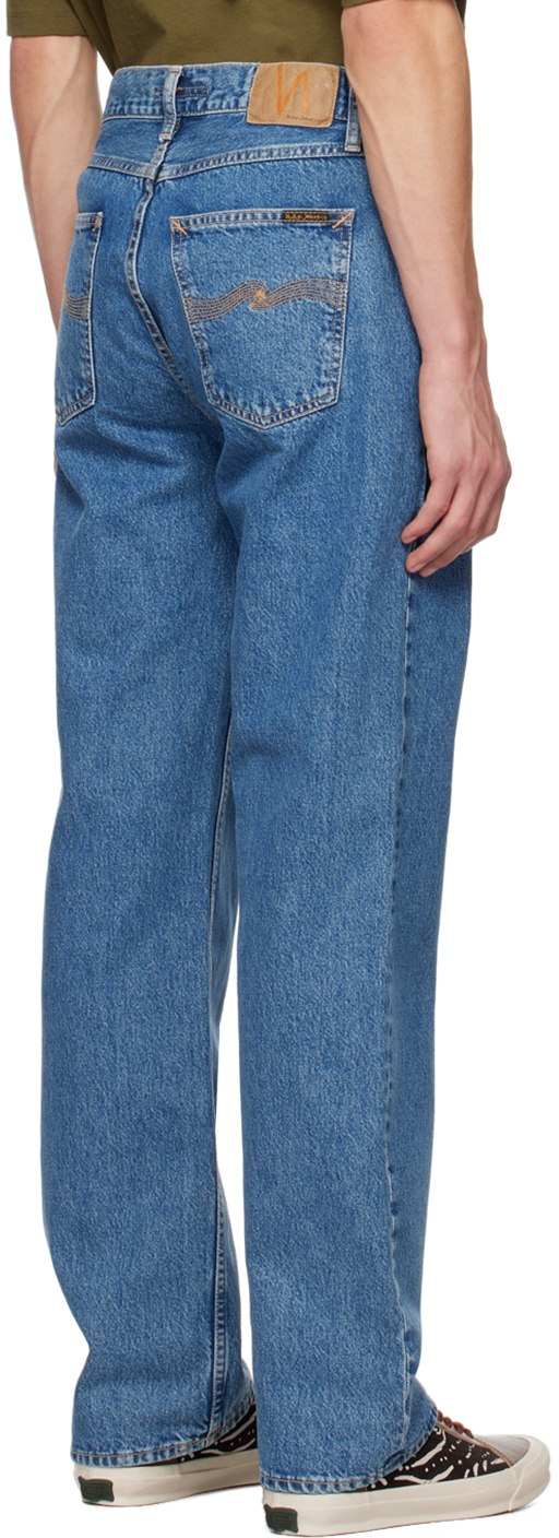 https://img.ssensemedia.com/images/b_white,g_center,f_auto,q_auto:best/231078M186031_3/nudie-jeans-blue-tuff-tony-jeans.jpg