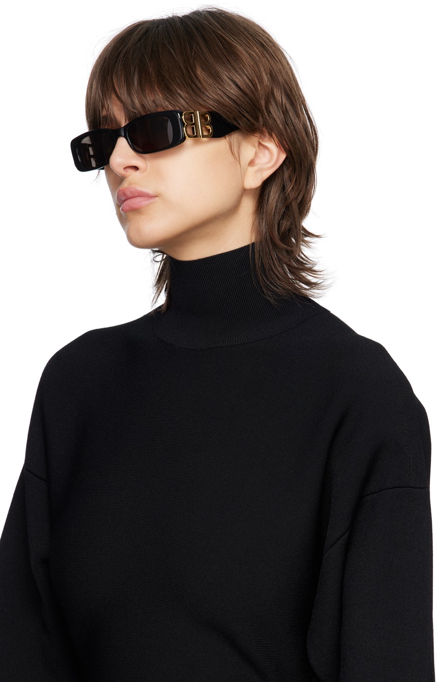 https://img.ssensemedia.com/images/b_white,g_center,f_auto,q_auto:best/231342F005060_4/balenciaga-black-dynasty-sunglasses.jpg