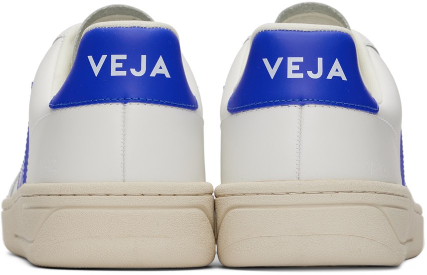 https://img.ssensemedia.com/images/b_white,g_center,f_auto,q_auto:best/231610M237093_2/veja-white-and-blue-v-12-sneakers.jpg