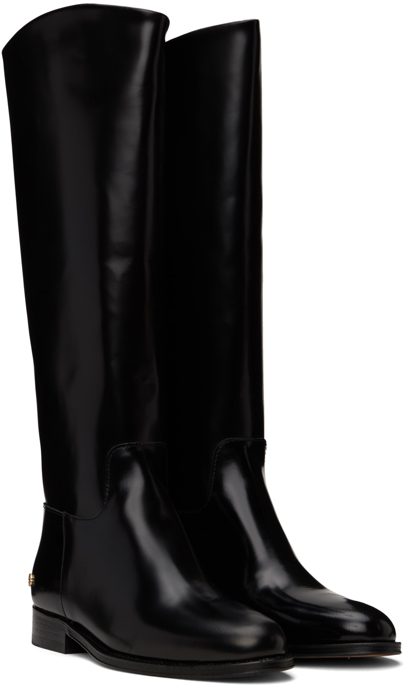 https://img.ssensemedia.com/images/b_white,g_center,f_auto,q_auto:best/232092F115002_4/anine-bing-black-kari-riding-boots.jpg