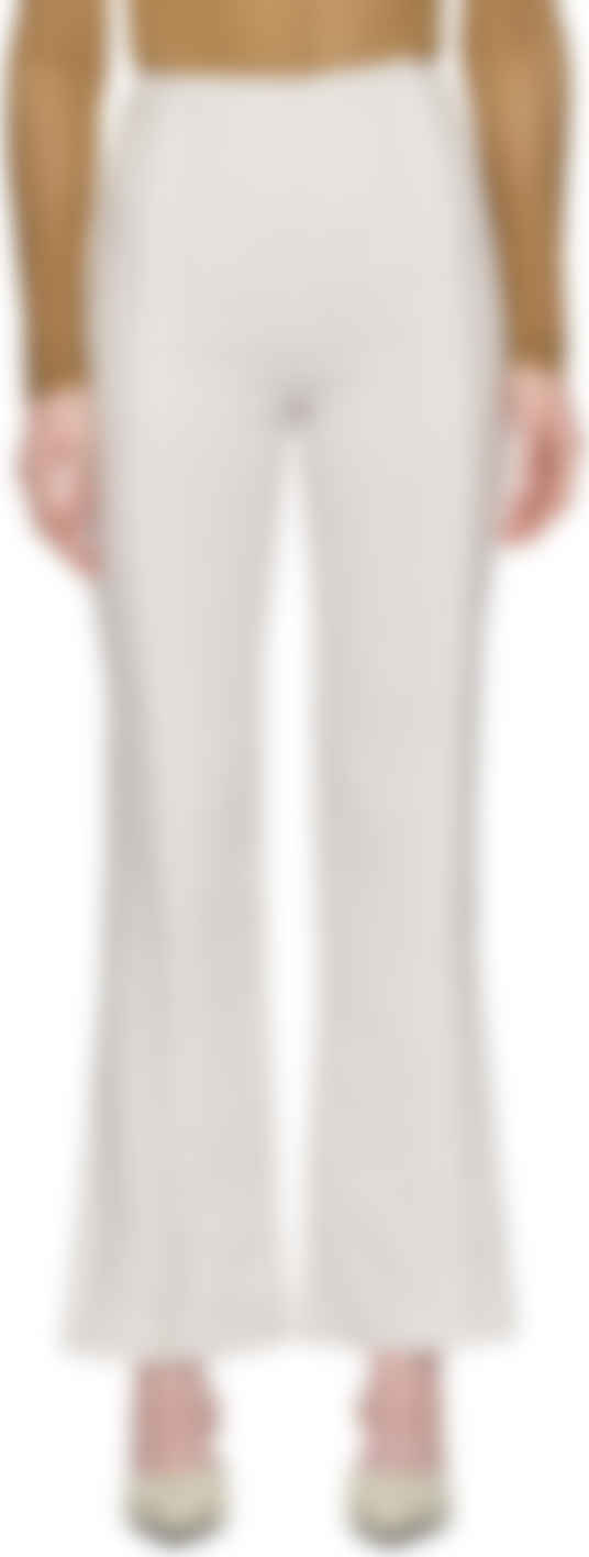 white linen flared trousers