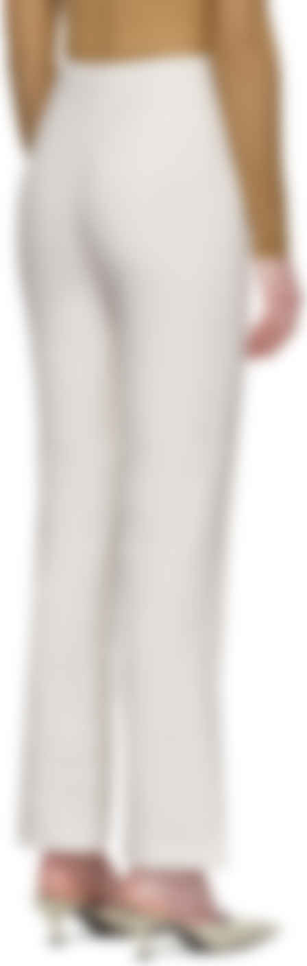 white linen flared trousers