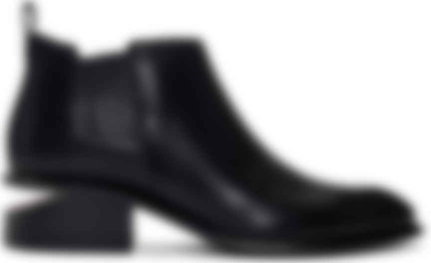 black and rose gold boots
